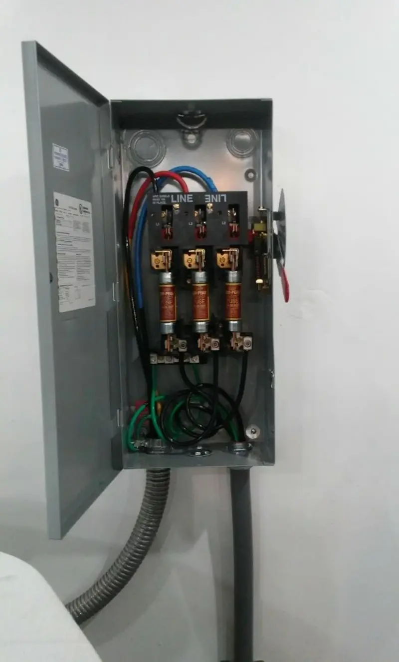 Three-phase disconnect switch installed for Smoke Detector Installation in Bunkie