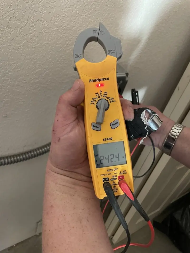 Voltage testing with clamp meter during Circuit Breaker Repair in Bunkie